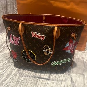 Authentic Gently used Neverfull MM with patches